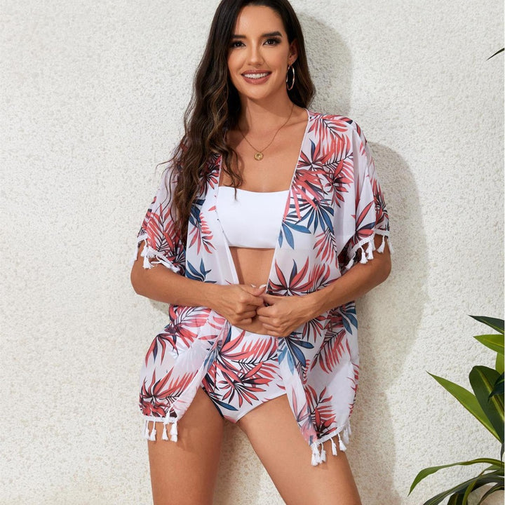 Dame elegant strandoutfit med floral overtræk og matchende bikini Skovae