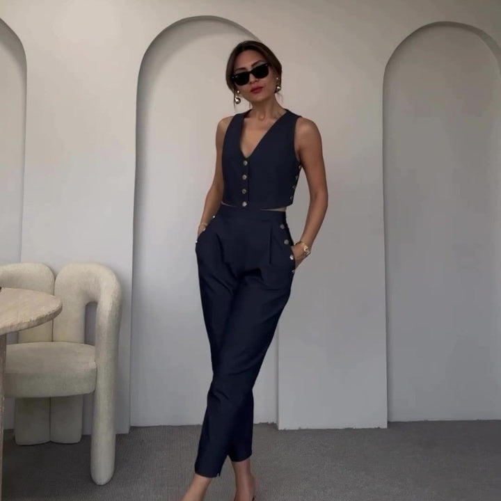 Dame crop-top med elegante knapper og højtaljede bukser Stilla