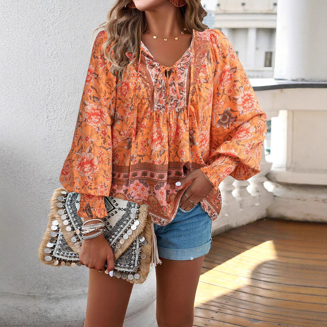 Dame Boho-stil bluse med blomsterprint og brede ærmer Stilla