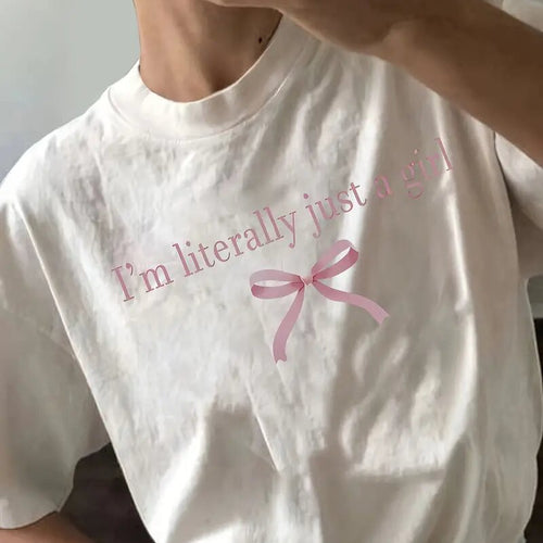 Dame T-shirt med sødt sløjfedesign og inspirerende citat Stilla