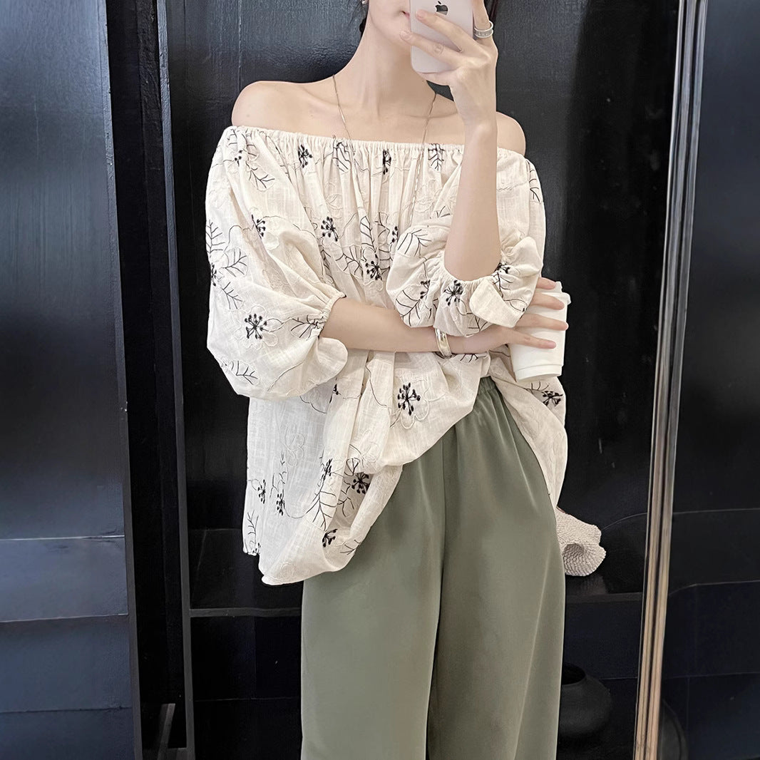 Dame let bluse top med elegant blomster mønster og brede ærmer Stilla
