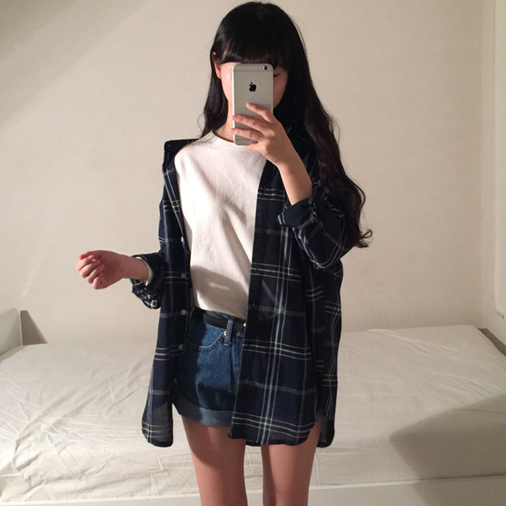 Kvinders stribede overshirt bluse i en afslappet pasform med oversized ærmer