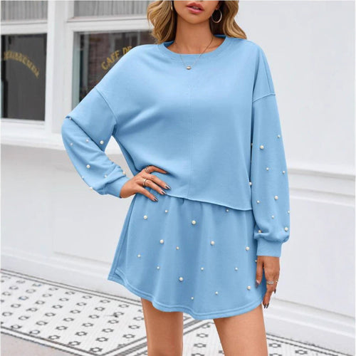 Dame nan perlebesat Sweat-Set med overskudt sweater og udstillet miniskørt Skovae