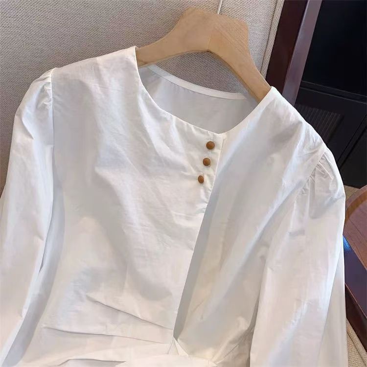 Damebluse med elegant sløjfe Stilla