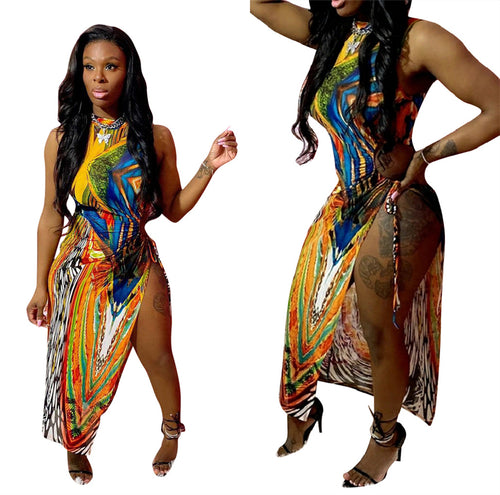 Dame Maxi-kjole med moderne asymmetrisk snit og farverigt print Stilla