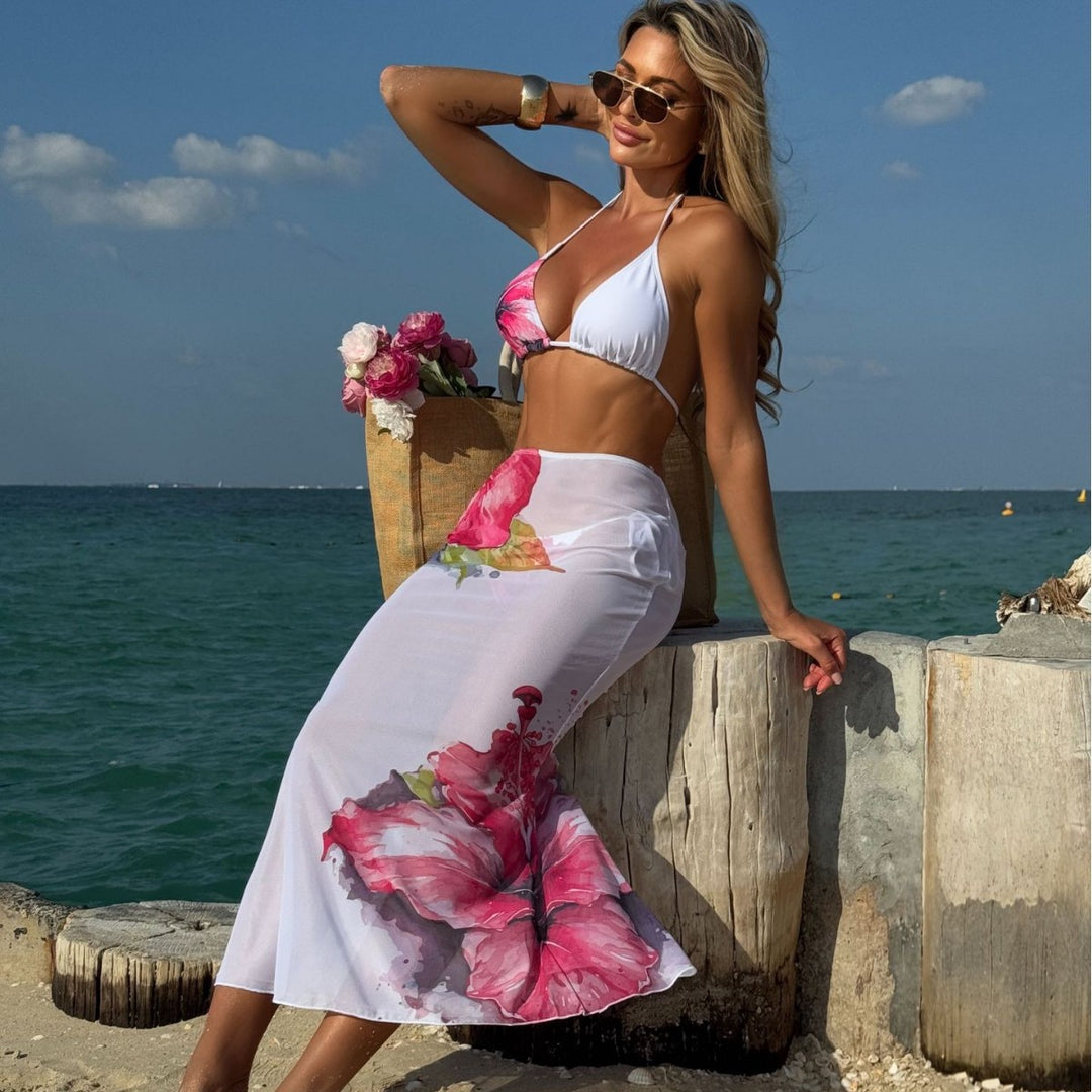 Dame Strandkjole med florale printdetaljer og let, flydende stof Stilla