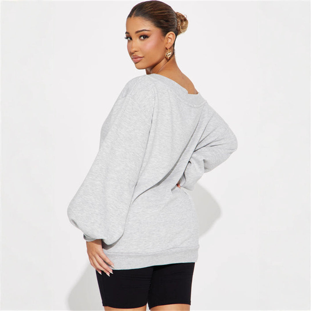 Kvinders oversized sweatshirt med asymmetrisk halsudskæring og ballonformede ærmer