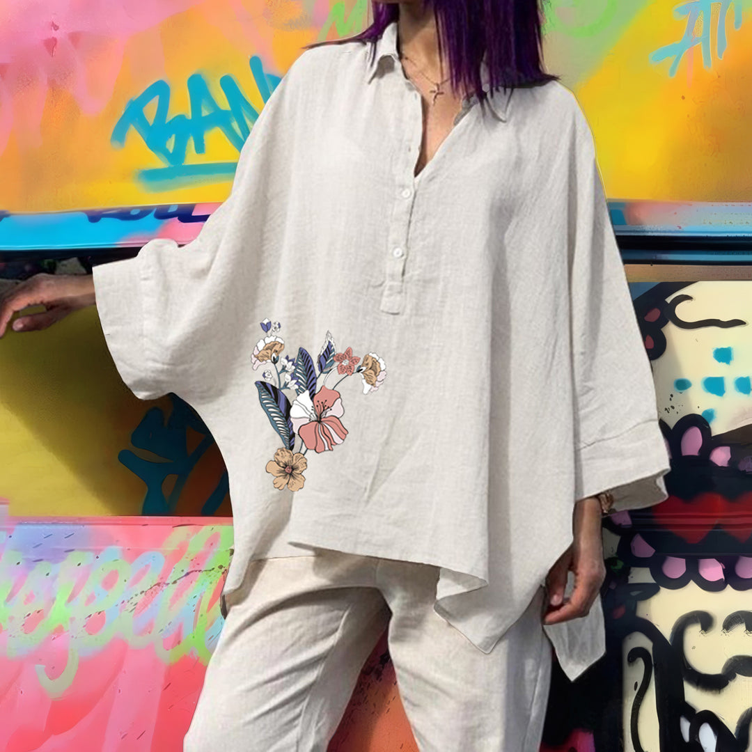 Damebluse i oversized stil med blomsterdesign Stilla