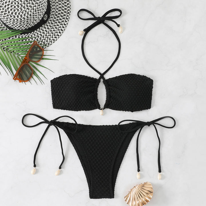 Dame bikini-sæt med innovativt bindemønster og trendy cut-out skovae