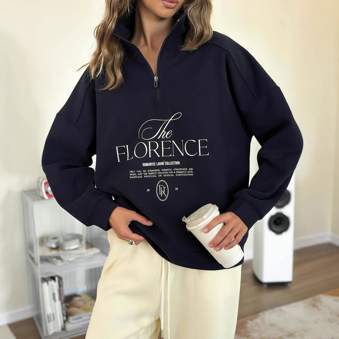 Kvinders statement sweater med høj krave og praktisk lynlås Stilla