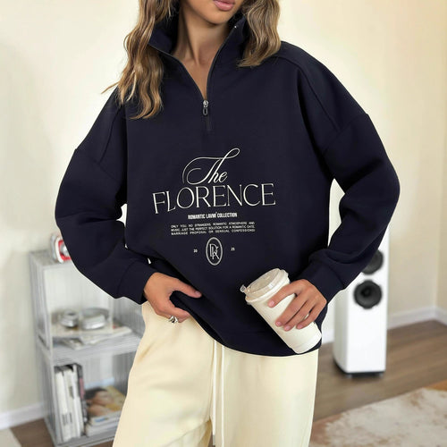 Kvinders statement sweater med høj krave og praktisk lynlås Stilla