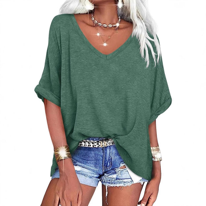 Dame afslappet V-hals T-shirt med oversized snit og plisseret detalje Stilla