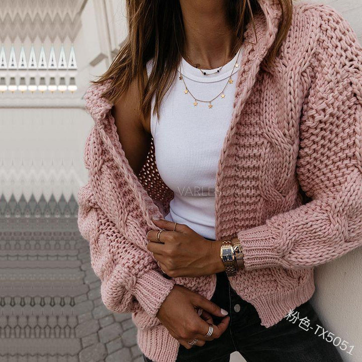 Kvinders chunky strikcardigan med voluminøse ærmer og moderne design Stilla