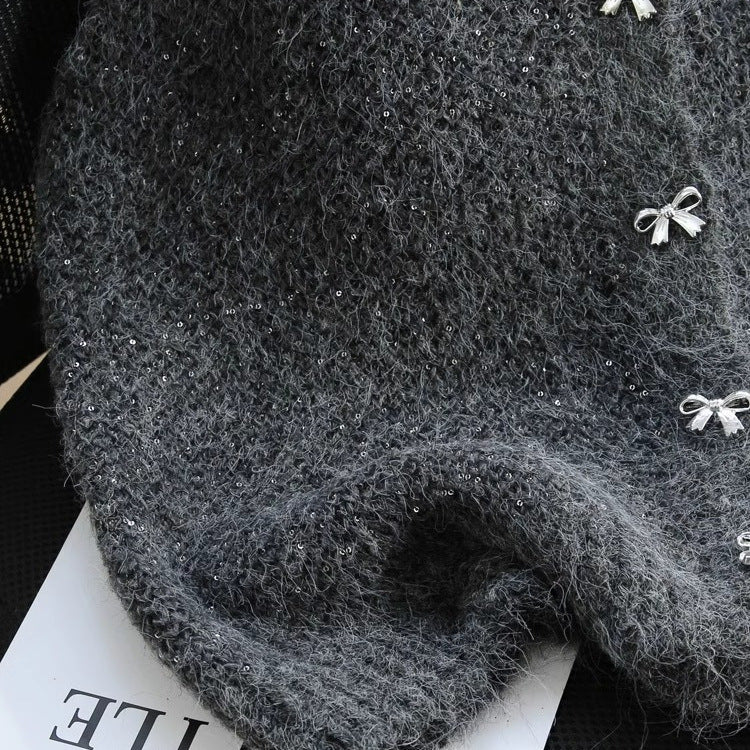 Dame strikket vest med glitrende accenter og dekorative knapper Stilla