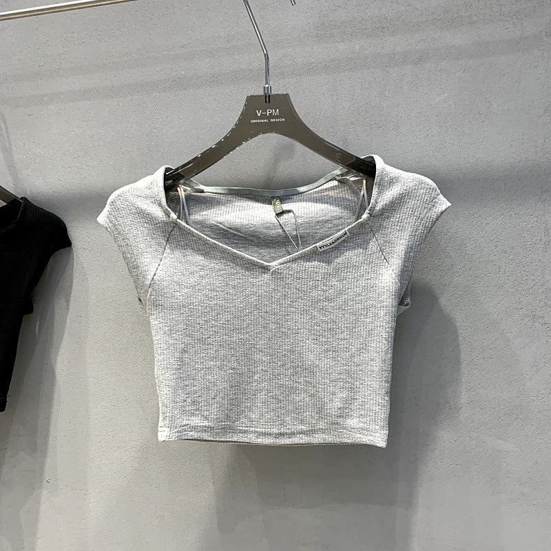 Femme Ripp Crop Top med overdimensioneret V-udskæring Stilla