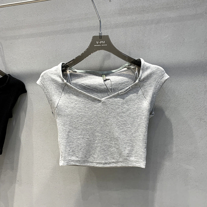 Femme Ripp Crop Top med overdimensioneret V-udskæring Stilla