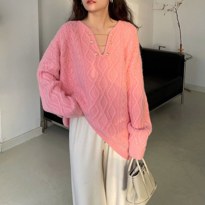 Dame chunky strik sweater med knapdetaljer og kabelmønster Stilla