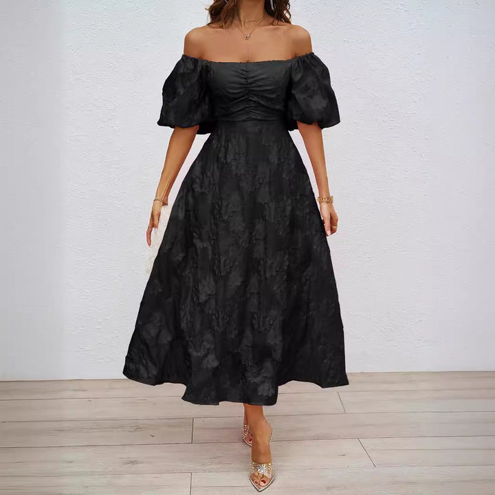 Dame maxikjole med skuldrestyret design og voluminøse puffærmer Stilla