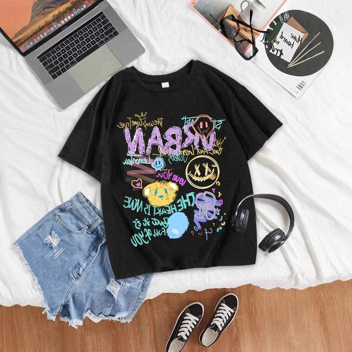 Dame oversized grafik T-shirt med urban design Skovae