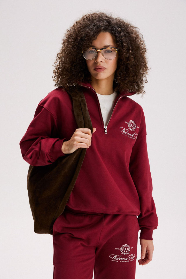 Kvindernes sporty zip-pullover med en afslappet pasform og elegant broderi Stilla