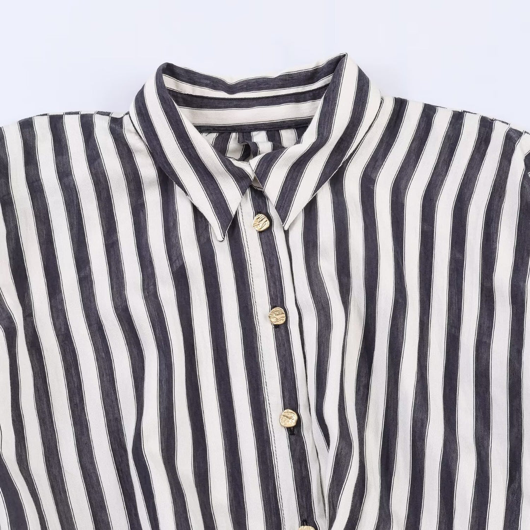 Dame jumpsuit med elegant stribemønster og dekorativt bælte Skovae