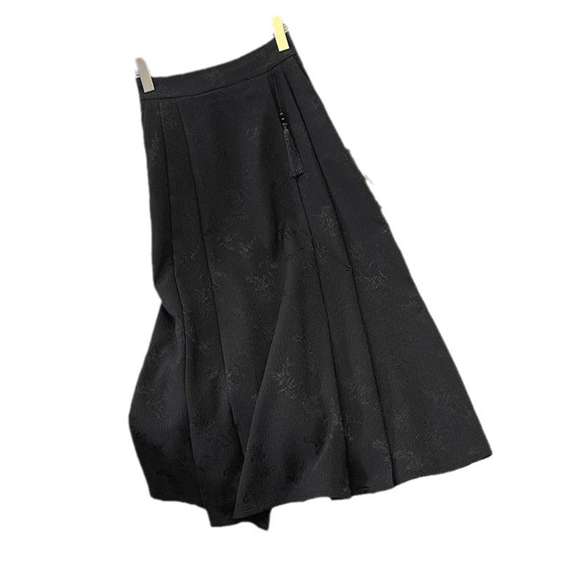 Kvinders elegante midi-nederdel med tekstureret stof og svajende snit