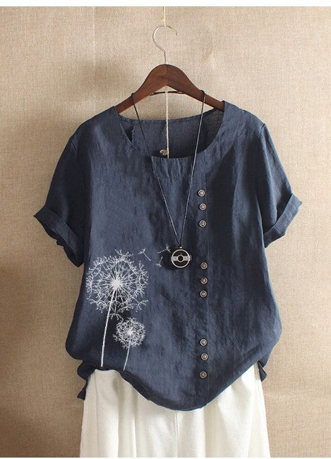 Dame kortærmet bluse med blomstret print og knapbar detalje Stilla