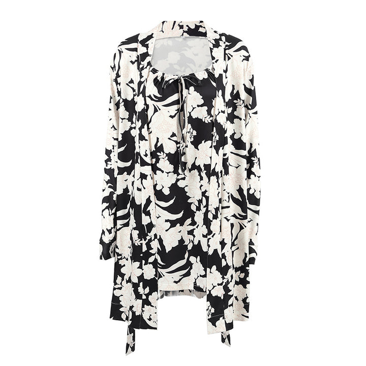 Dame elegant bluse- og kjolesæt med floralt mønster og detaljerede ærmeafslutninger Stilla