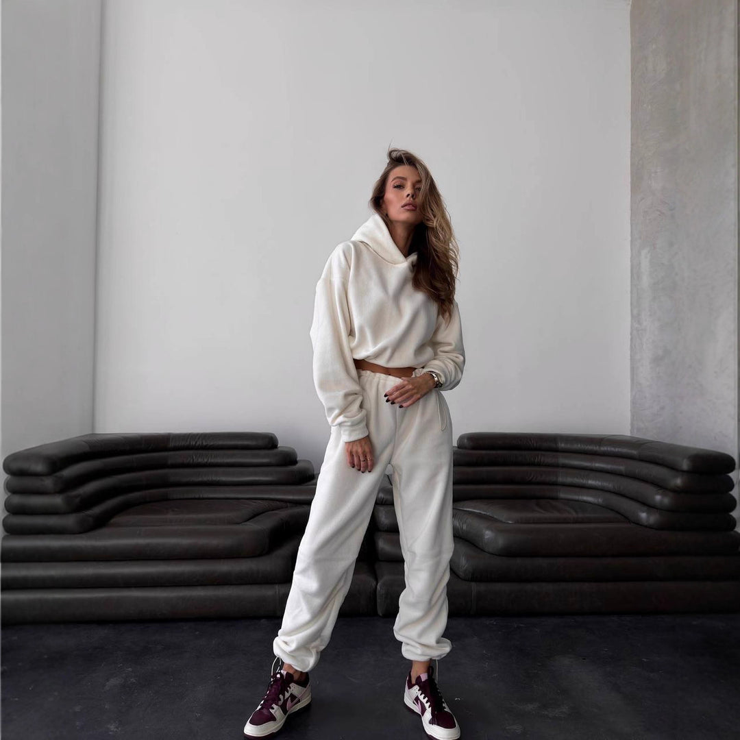 Kvindernes komfortable fleece jumpsuit med hætte og elastisk talje
