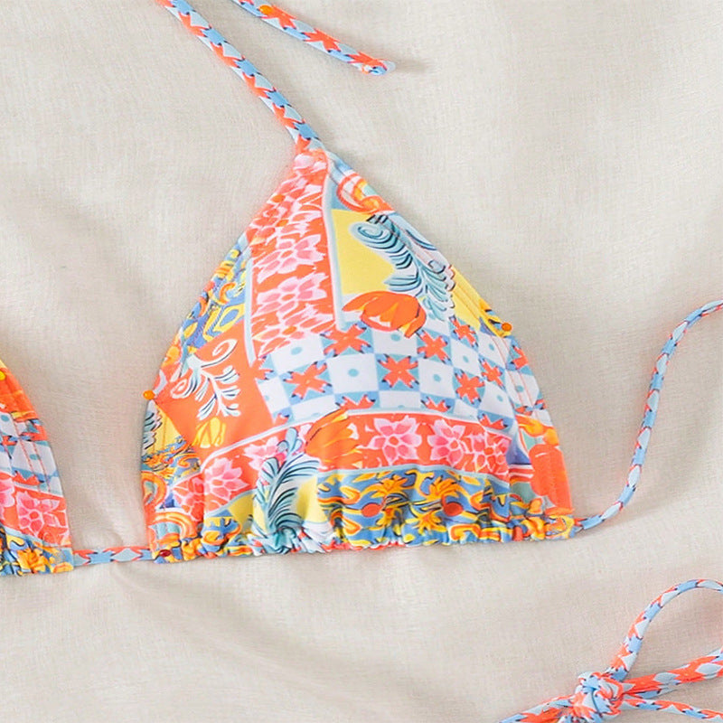 Dame triangel-bikini med legende blomsterdesign og elegante bånd