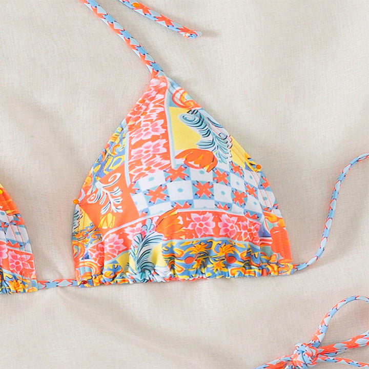 Dame triangel-bikini med legende blomsterdesign og elegante bånd