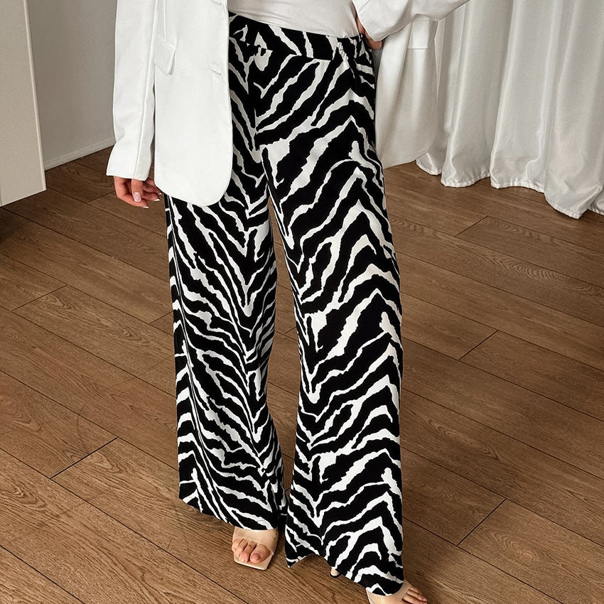 Dame bred Zebra-print Palazzo-bukser med elastisk talje og elegant snit Stilla