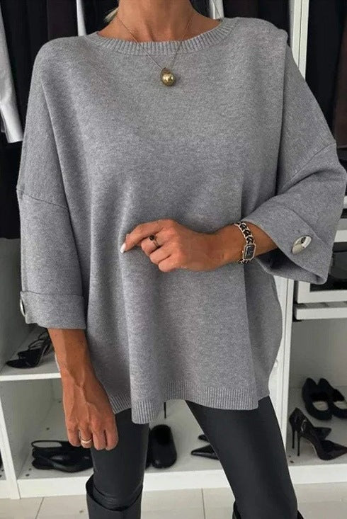 Dame elegant top med dekorative knapper og generøs pasform Stiila