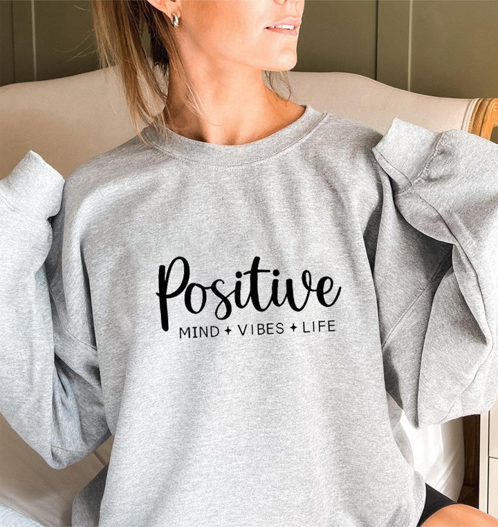 Kvinders sweatshirt med voluminøse ærmer og inspirerende print Stilla
