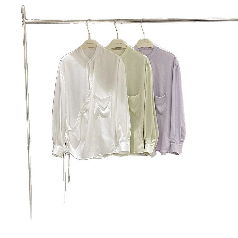 Damebluse med innovativt draperet design og fine detaljer Stilla