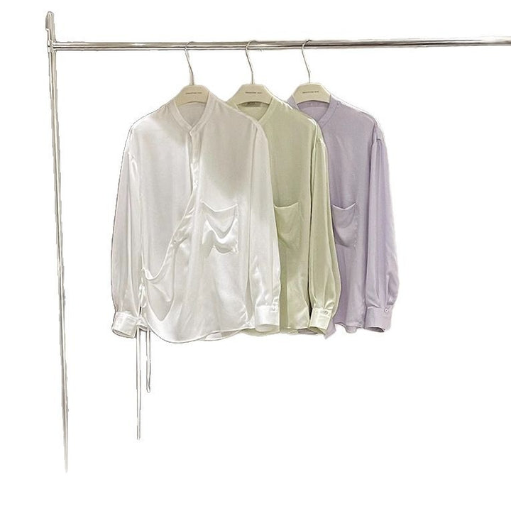 Damebluse med innovativt draperet design og fine detaljer Stilla