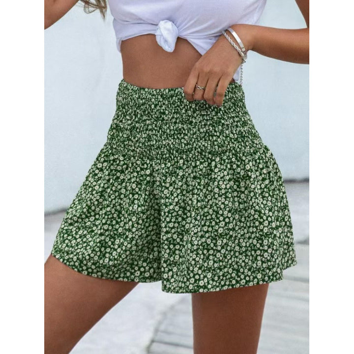 Dame shorts med elastisk taljebånd og blomsterdesign Skovae