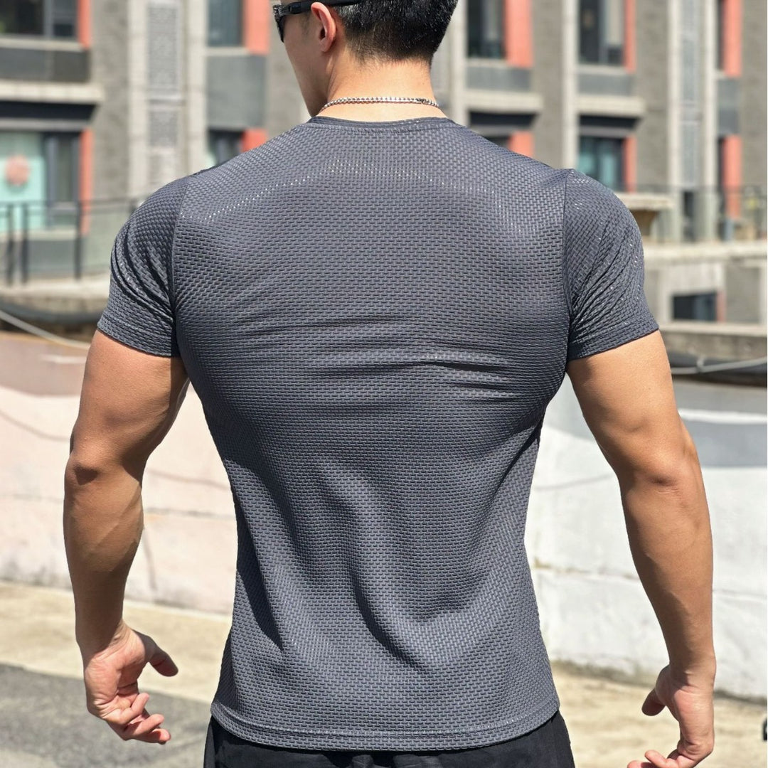 Herrer Aktiv-T-shirt lavet af åndbart strukturmateriale med kropsnær pasform Stilla
