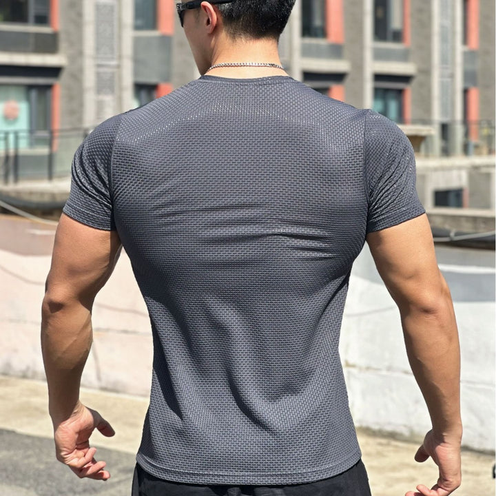 Herrer Aktiv-T-shirt lavet af åndbart strukturmateriale med kropsnær pasform Stilla