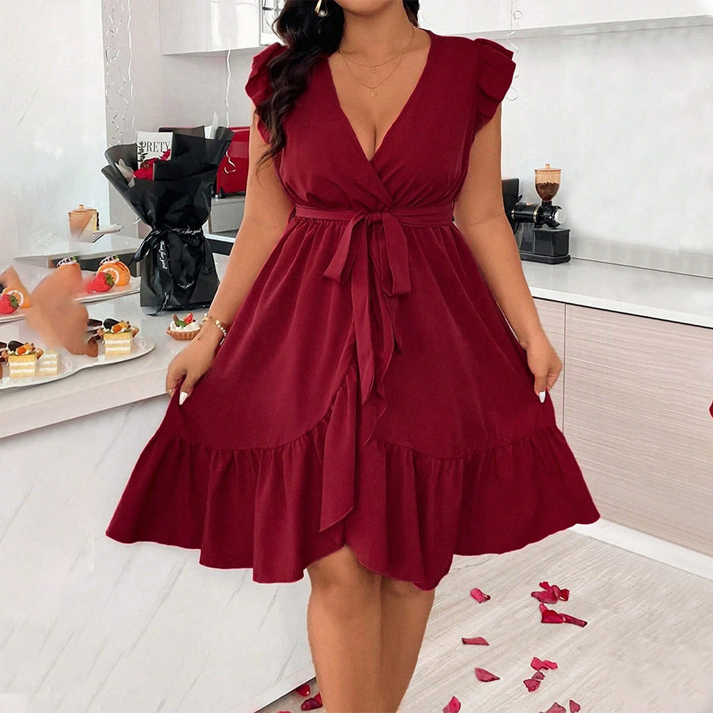 Dame omslagskjole med voluminøs nederkant og flæse detaljer Stilla