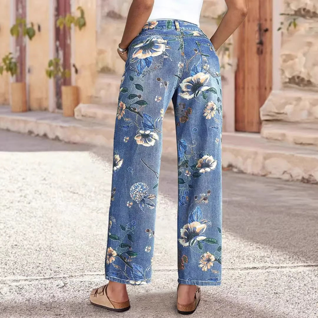 Kvindelige brede snit jeans med blomsterdesign og høj talje