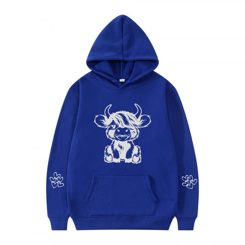 Kvindernes hætte sweatshirt med charmerende kvægmotiv og praktiske kængurulommer Skovae