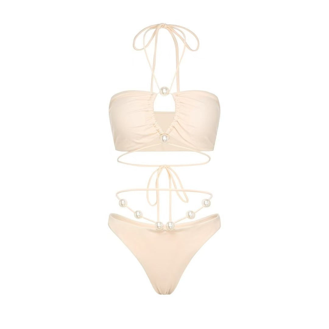 Dame bikini-sæt med modedetalje af perler og elegant nederdel Stilla