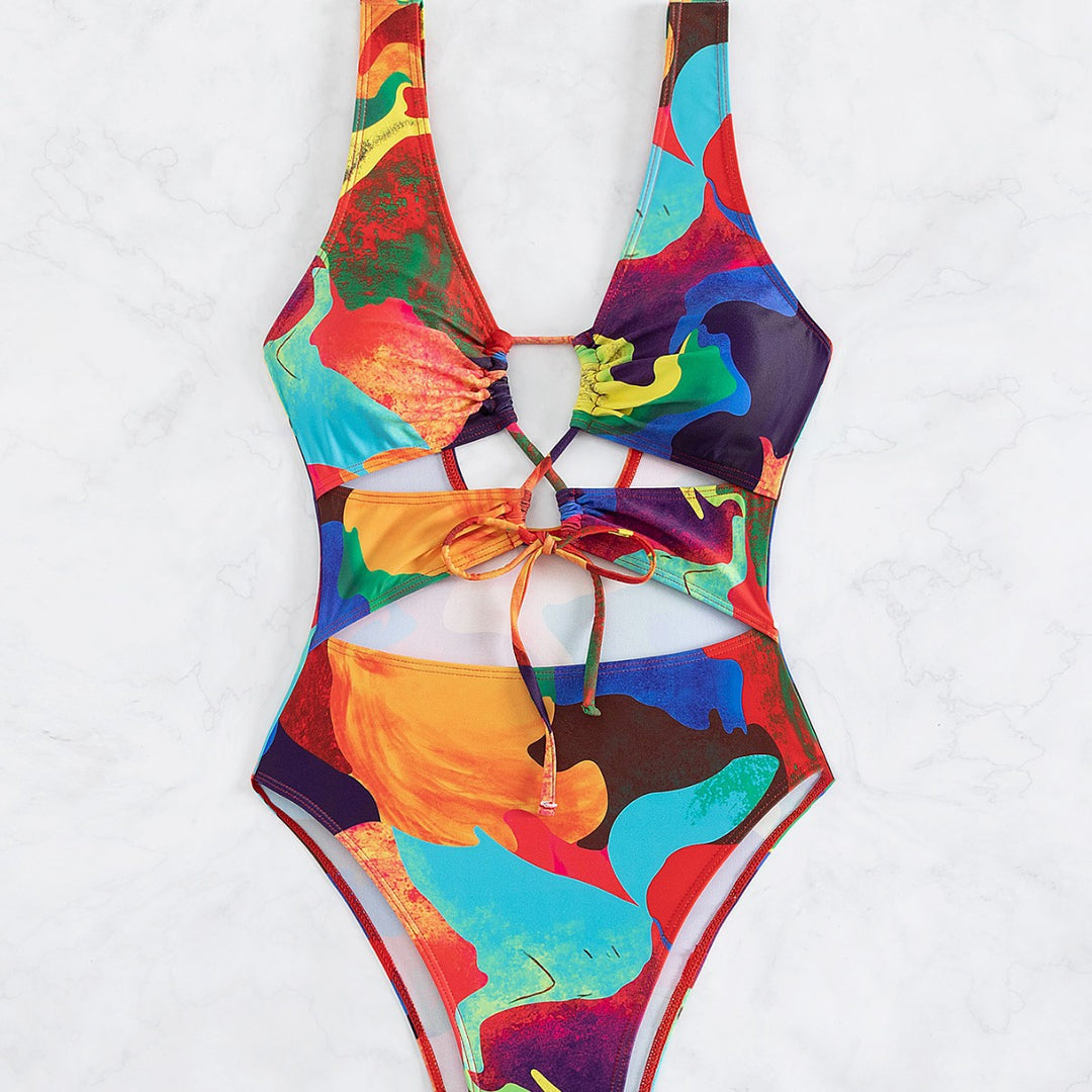Dame heldragt badedragt med farverigt cut-out-design Skovae