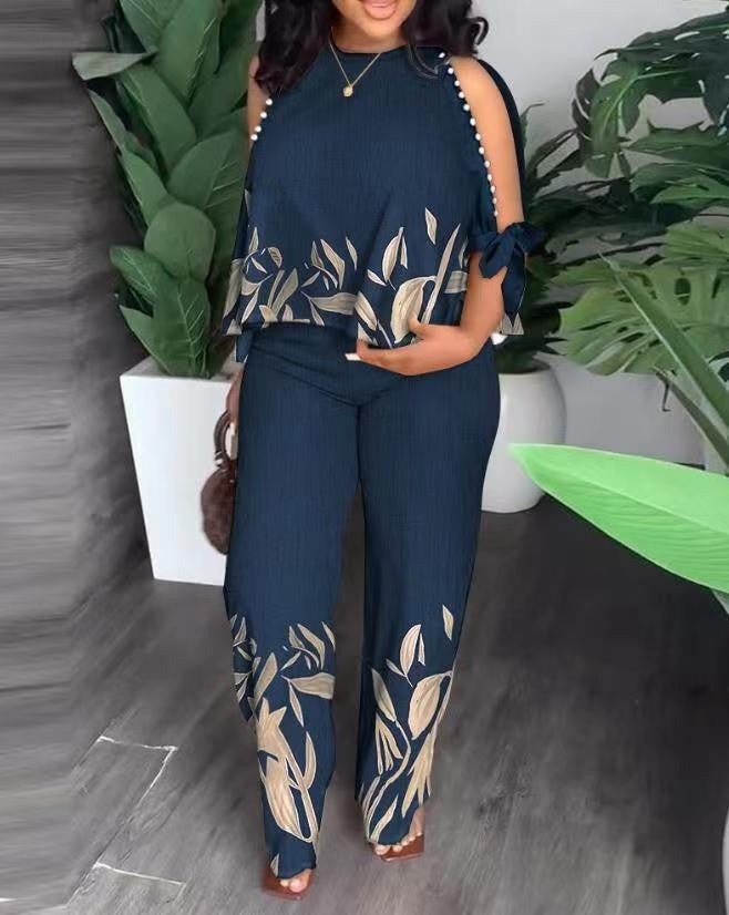 Dame Elegant designet sommeroutfit med blomstermønster og skulderfri overdel Skovae