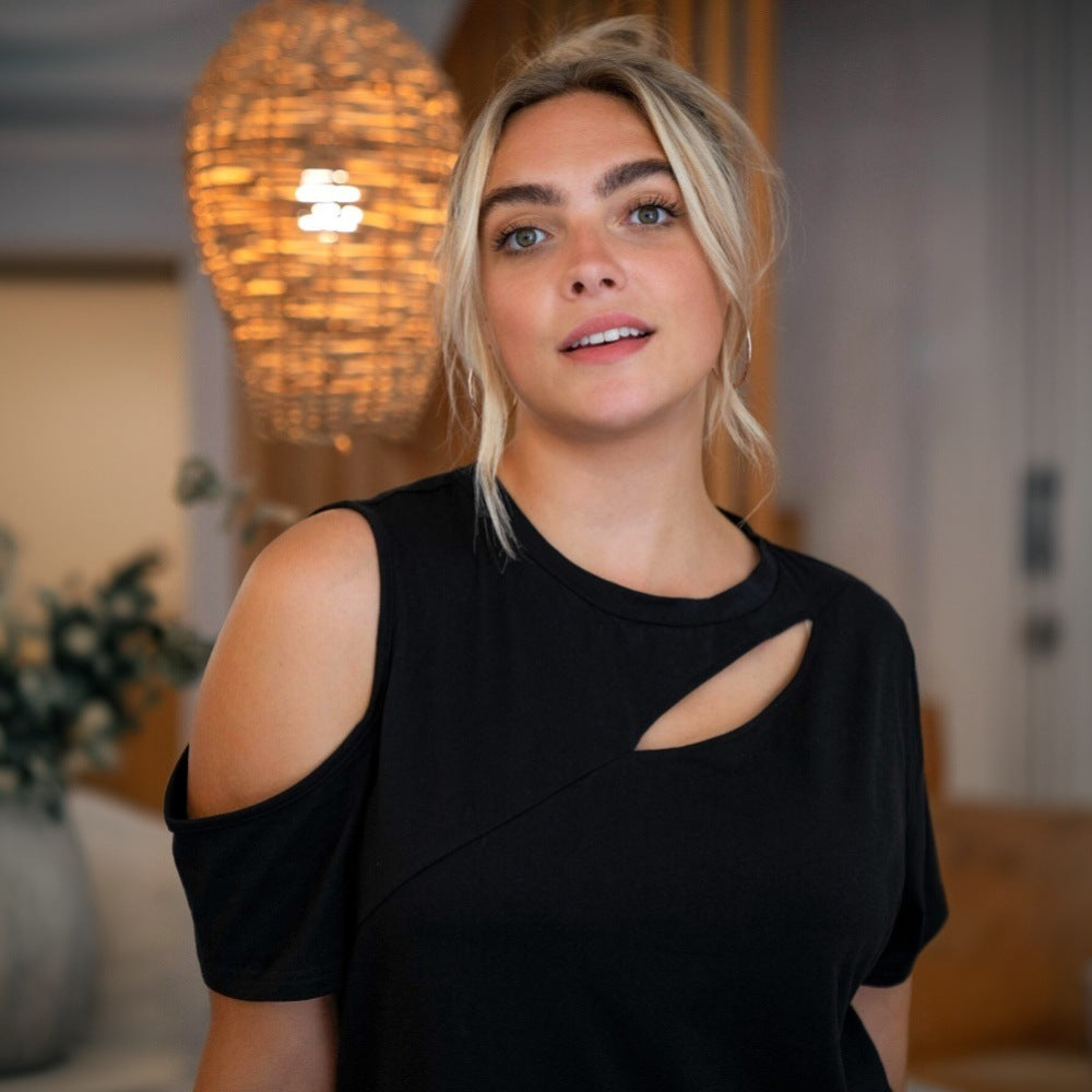 Dame fashion top med innovativt cut-out design Stilla