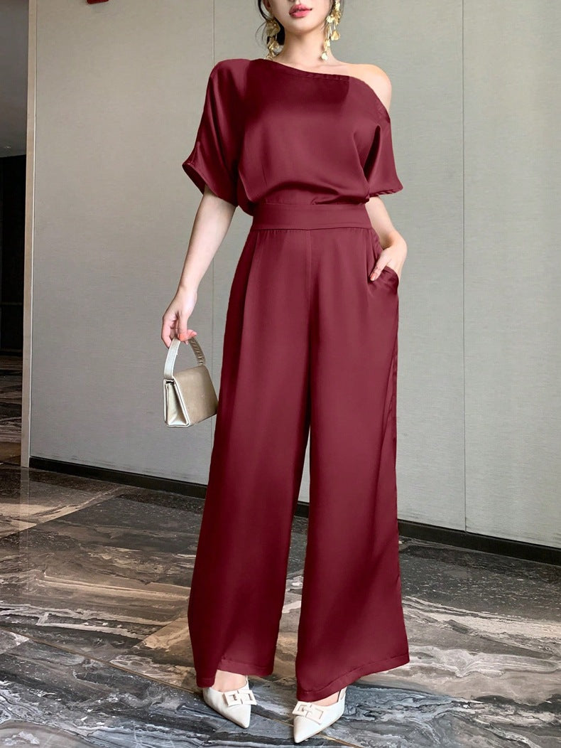 Dame Én skulder jumpsuit med bred ben og elegant snit Skovae