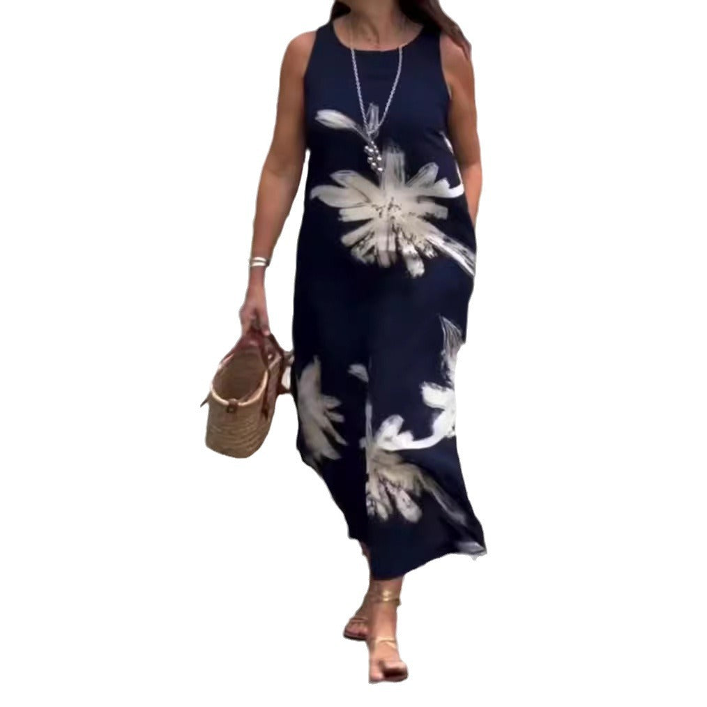 Dame maxikjole med blomsterdesign og sidelommer Stilla
