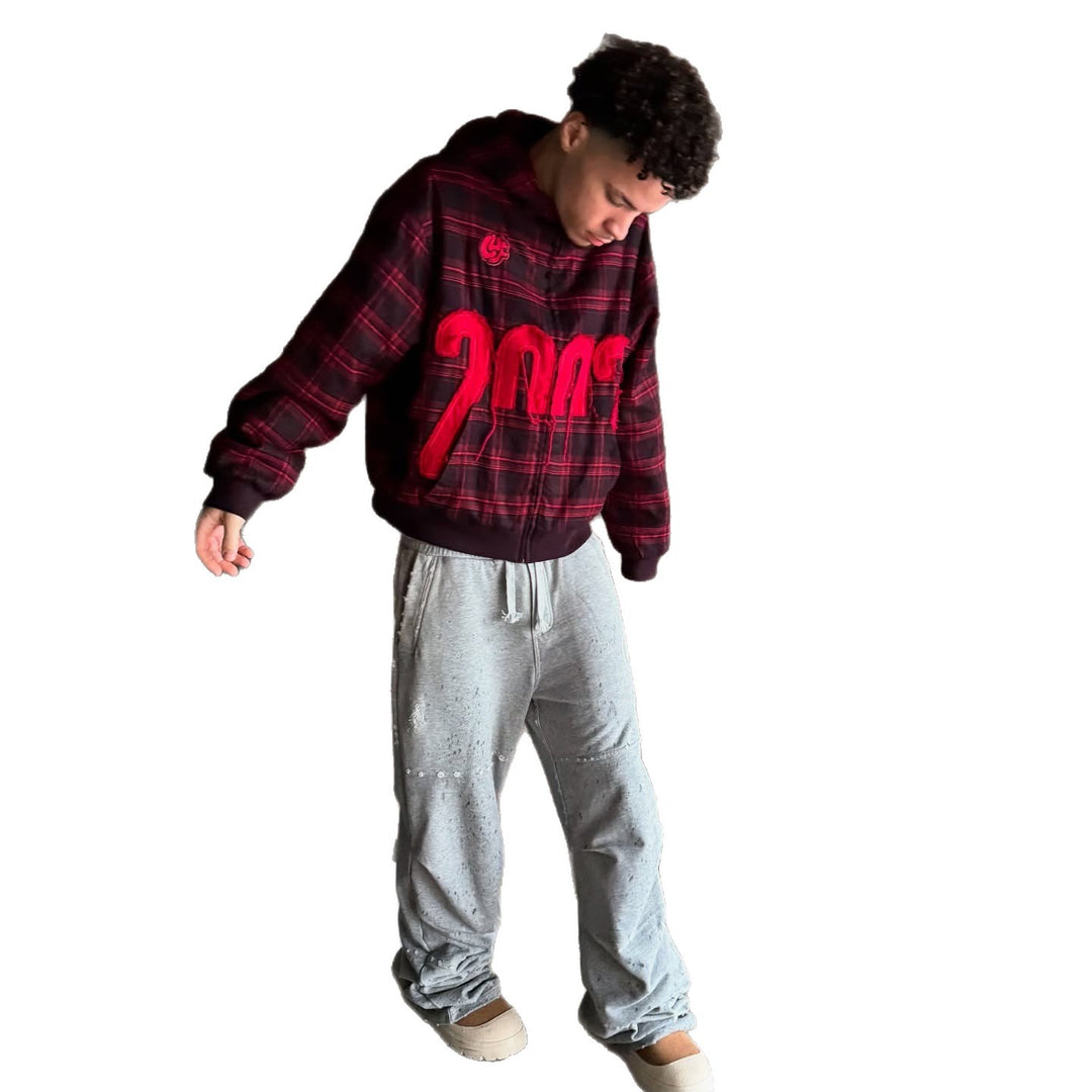 Unisex nan checkered hoodie with frayed year appliqué and ribbed cuffs Skovae