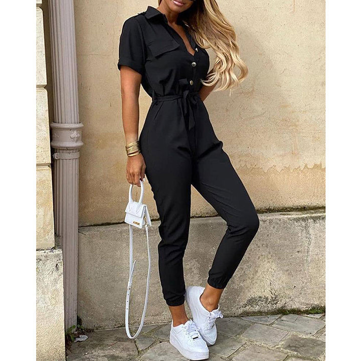 Dame moderigtigt jumpsuit med praktisk knaplukning og elastisk talje Stilla